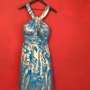 Aidan Mattox  blue and gold halter dress.